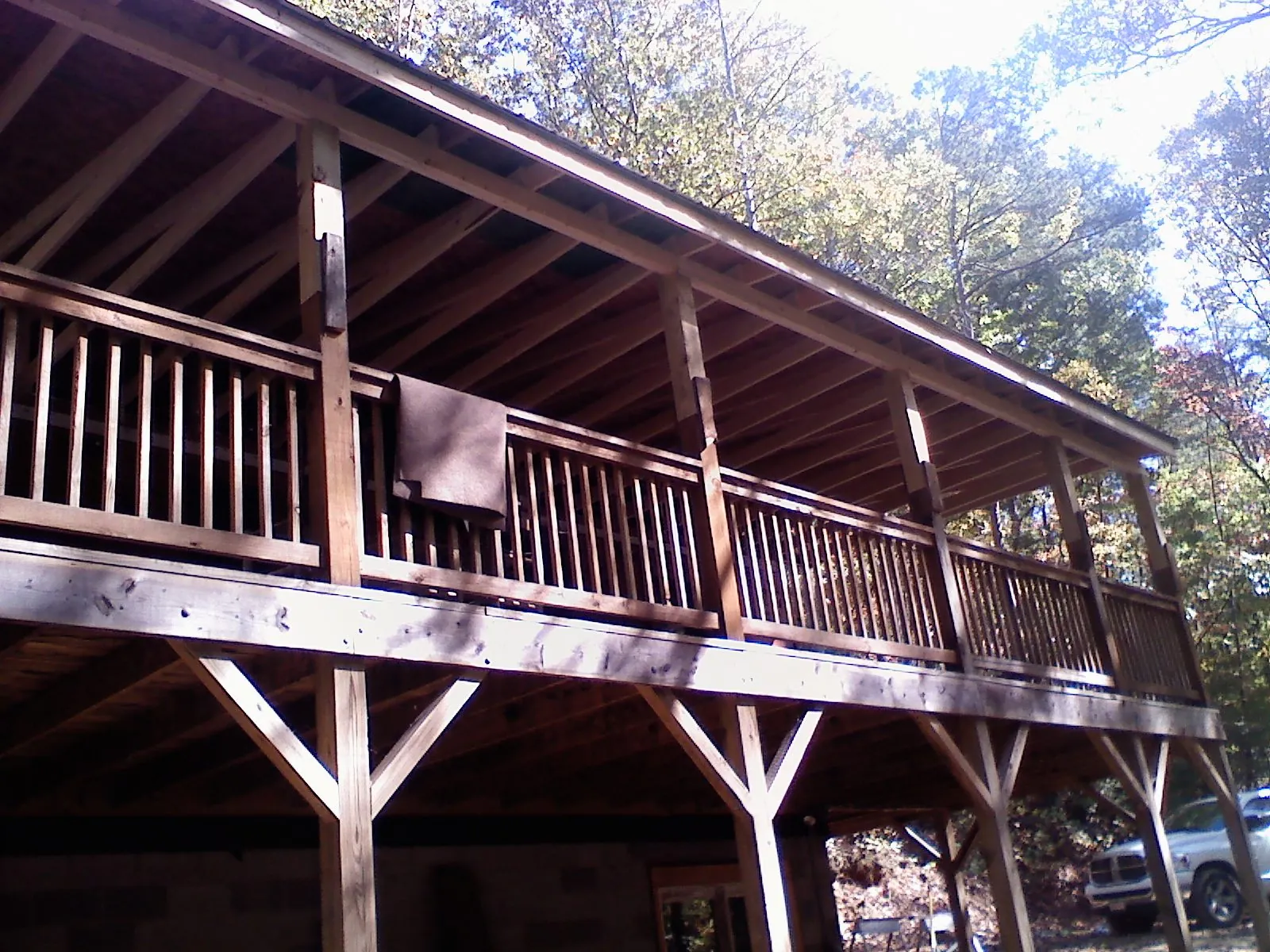 Timber framing under a new elevated porch and deck — Roof Leak Repair in Rich Hill by Roofing Brothers